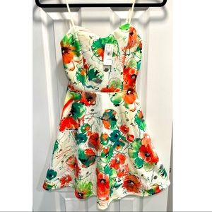 Brand new, never worn, size Medium spaghetti strap dress.